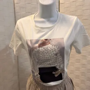 Bedazzled Tee with feathers